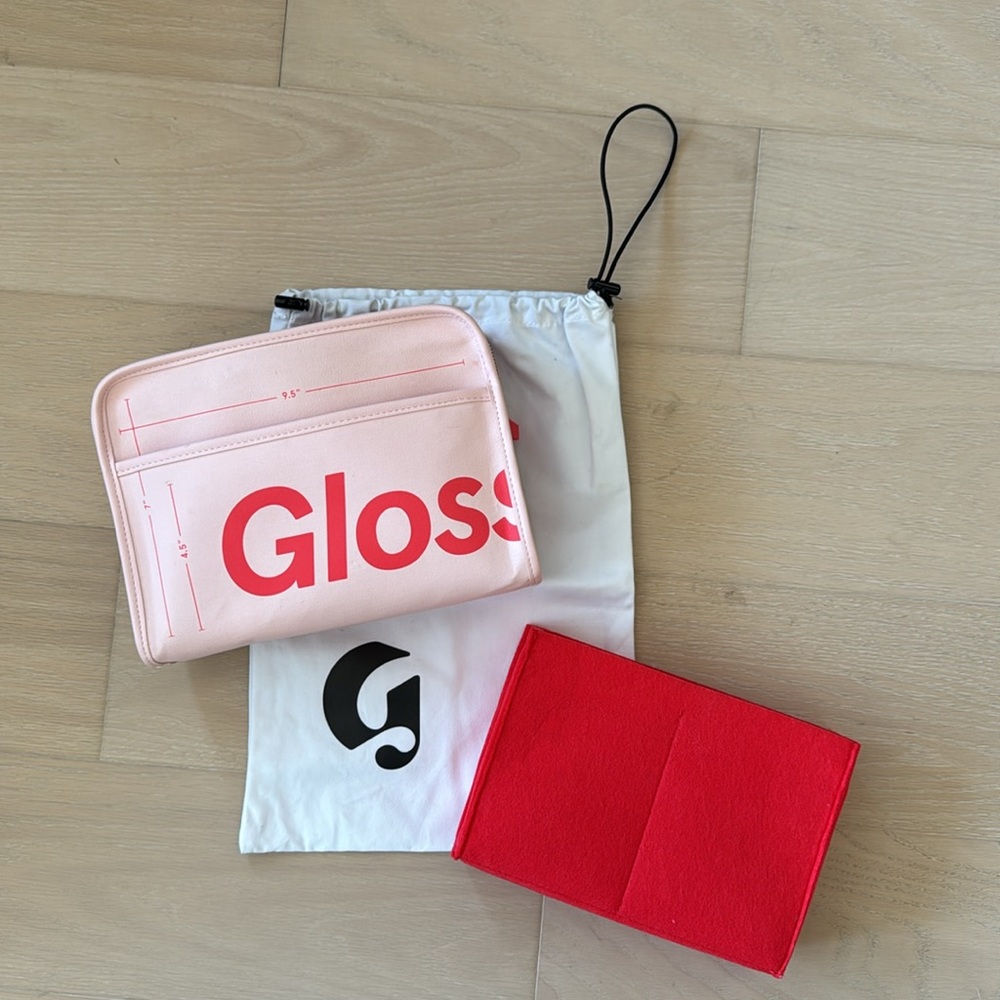 Glossier Beauty bag in pink.
